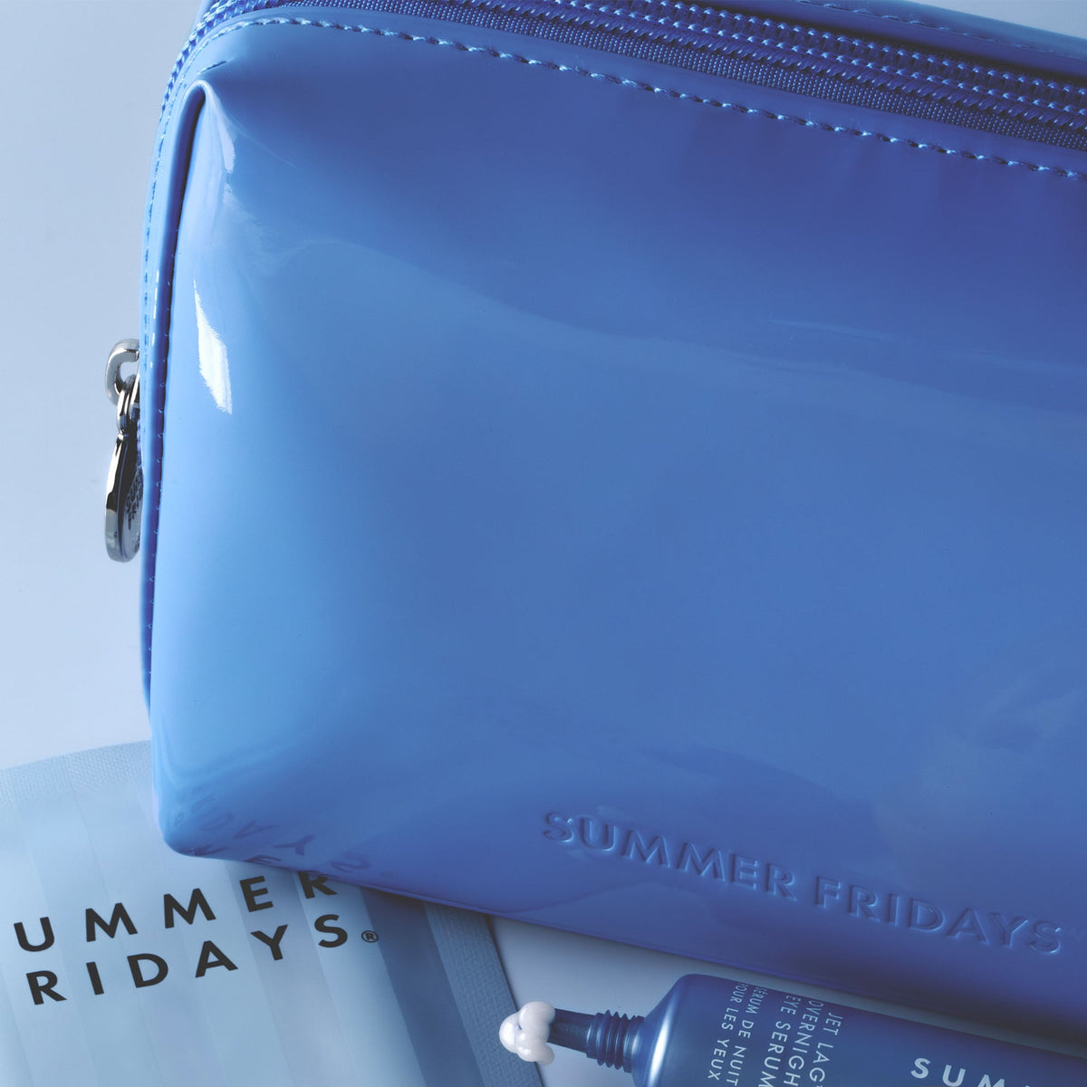 glossy-pouch-in-jet-lag-blue-v0 Glossy-Pouch-Jet-Lag.jpg