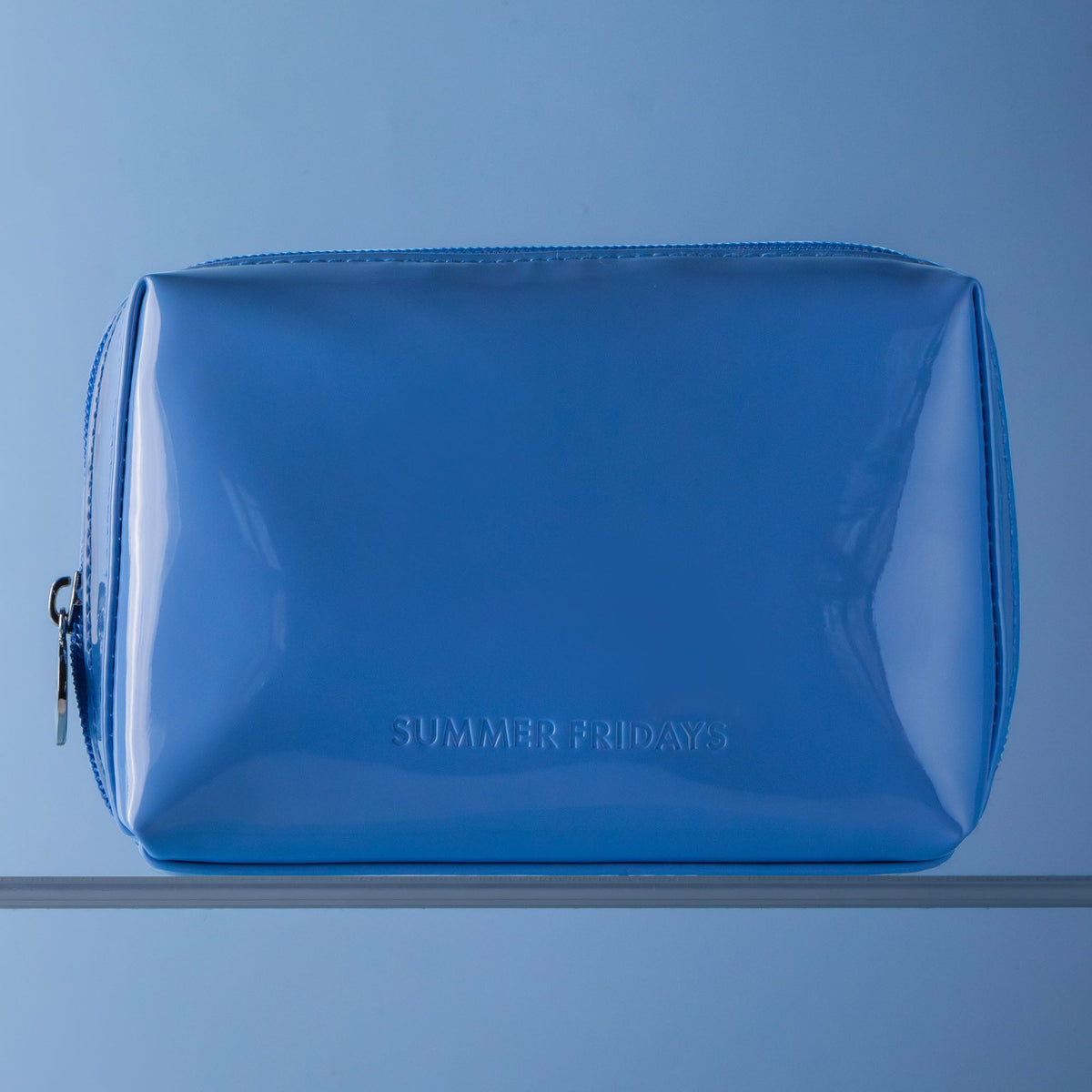 glossy-pouch-in-jet-lag-blue-v0 Glossy-Pouch-Jet-Lag-2.jpg